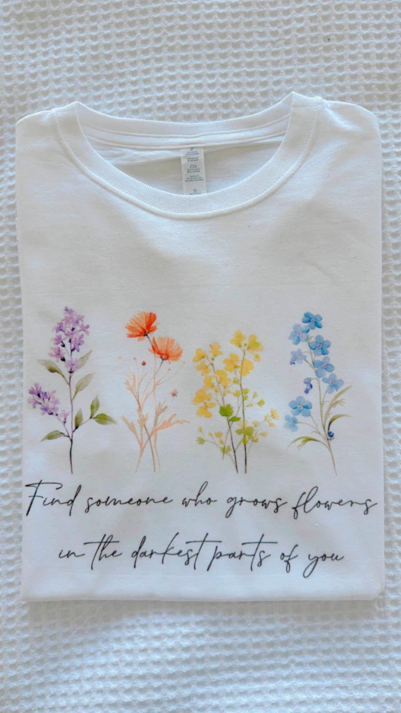 Find Someone Who Grows Flowers In The Darkest Parts of You White T-Shirt